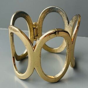 Vintage Gold Tone Hinged Oval Openings Cuff Bracelet